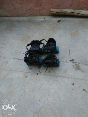 Pair Of Black-blue Foot Braces