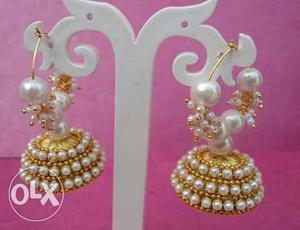Pair Of Gold Jhumkas With Pearls