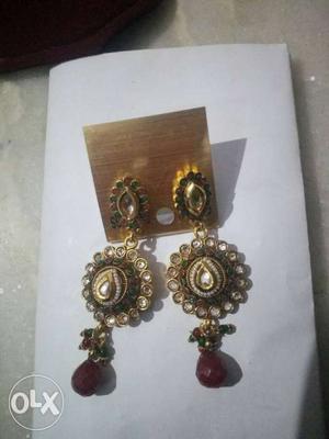 Pair Of Gold-and-red Dangling Earrings