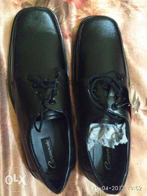 Pair Of Men's Black Leather Oxford Shoes