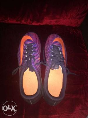Pair Of Purple-and-orange Nike Cleats