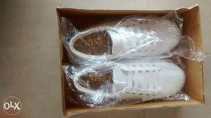 Pair Of White Shoes, unused. Perfect condition. For women