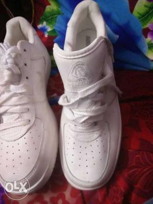 Pair Of White Sneakers