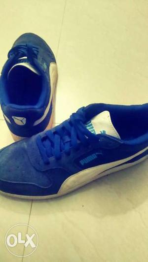Pair Of White-and-blue Puma Low Top Sneakers