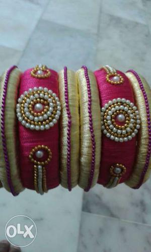 Pink and gold combination thread bangles