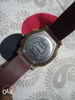 Round Black Watch With Brown Leather Straps