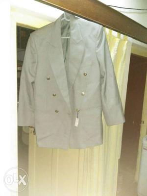 SILVER COLOURED BLAZER. Which is only once used.