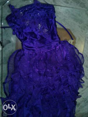 A Violet colour satin gorgeous gown for girls