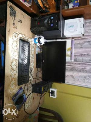 Black Flat Screen Monitor, Keyboard, Tower And Mous
