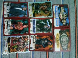 Eight WWE Trading Cards