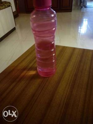 Pink And Clear Plastic Bottle