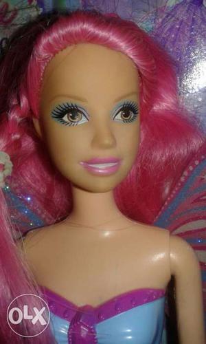This is a new barbie this doll is cime in a