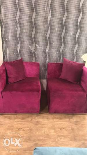 2 hot pink chair sofa wid cushions