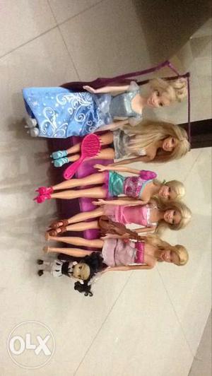 5 barbie dolls with 1 barbie bed