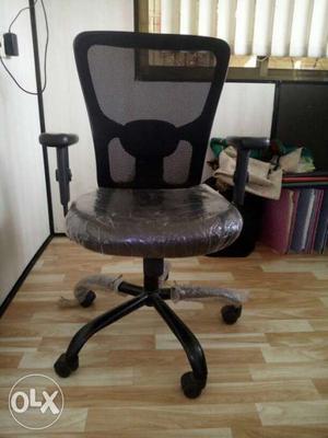 Black net branded chair