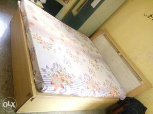 Double bed with two side table.