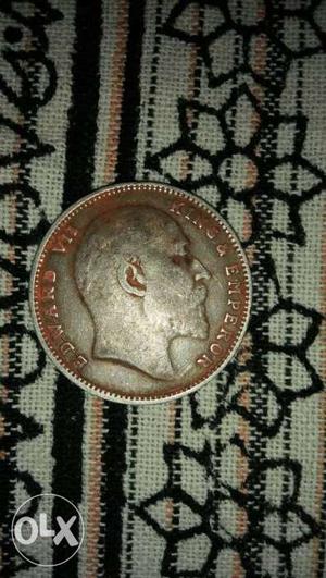 One silver nd four Brown nd copper Coins