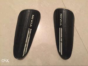 Pair Of Black Nivia Safety Pads