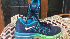 Pair Of Black-blue-and-green Nike
