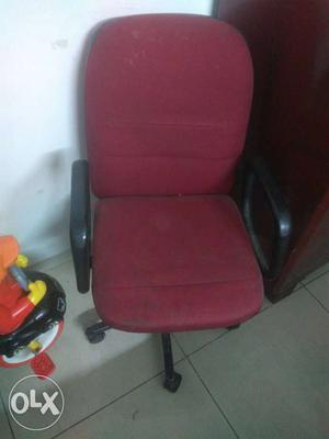 Revolving chair. maroon color