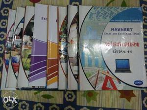 Textbooks and Navneet guides for 11th Commerce