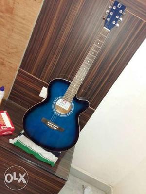 This is an imported guitar with a very nice blue