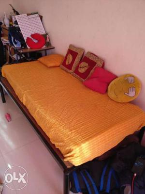 Wooden bed with Kurl-on coir mattress