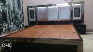 15 days old Bed with boxes.it is a queen size bed wid side