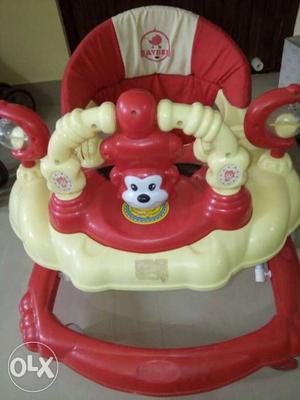 Baby walker in very new condition with lights and