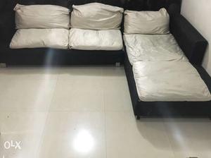 Black And White Leather Padded Sectional Sofa