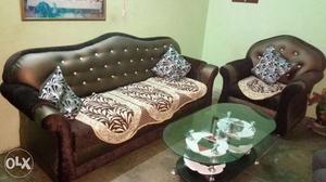 Black Leather Tufted Couch And Armchair