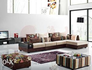 Brown And White Sectional Couch With Throw Pillow