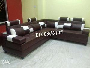 Brown Leather Tufted Sectional Sofa With Throw Pillows
