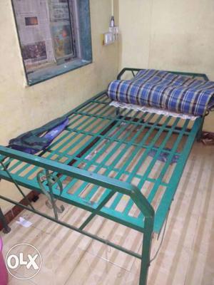 Foldable 4x6 iron bed in good condition without