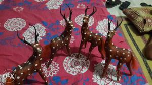 Four Brown Deer Ceramic Figurines