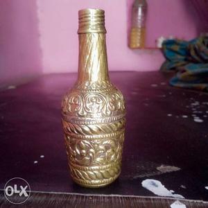 Gold-colored Embossed Bottle