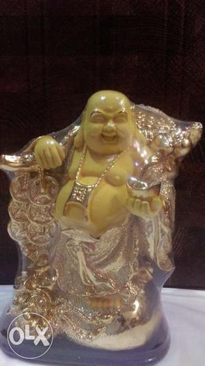 Golden and yellow laughing buddha show piece