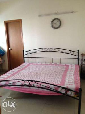 King size iron bed with mattress in good condition