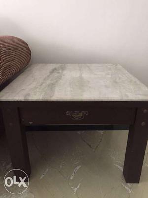Side tables with marble tops. In good condition