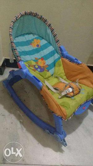 Sparingly used NEWBORN TO TODDLER PORTABLE ROCKER - in less