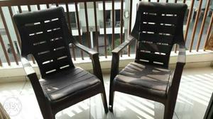 Two Black Monoblock Chairs