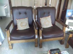 Two Brown Wooden With Brown Leather Armchairs