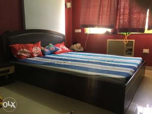 Wengi color bed with 2 side tables and same