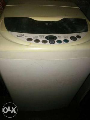 White And Beige LG Top Load Washing Machine