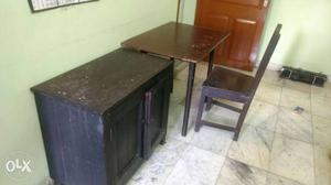 Wooden table chair and low height cupboard