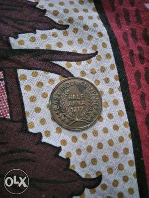 Half anna coin available