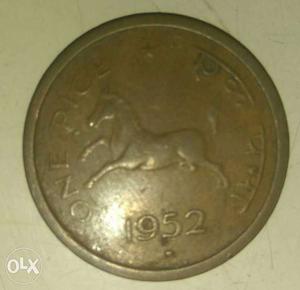  One anna coin with a symbol of running horse,