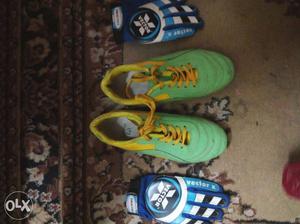Pair Of Green-and-yellow Soccer Cleats; Pair Of