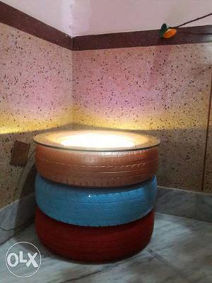 Tyre table with tri colour LED light effects...