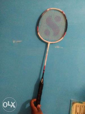 White, Black And Red Badminton Racket